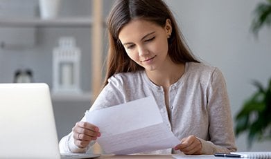 Patient reading and reviewing a billing statement